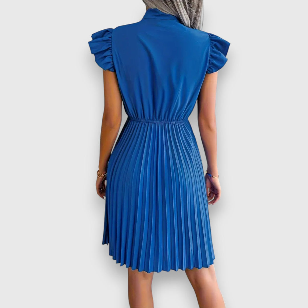 Nivara – Pleated Dress with a Feminine Touch