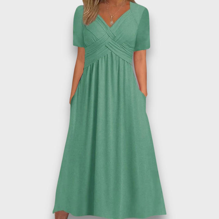 Enyelle – Dress with Delicate Wrap Look