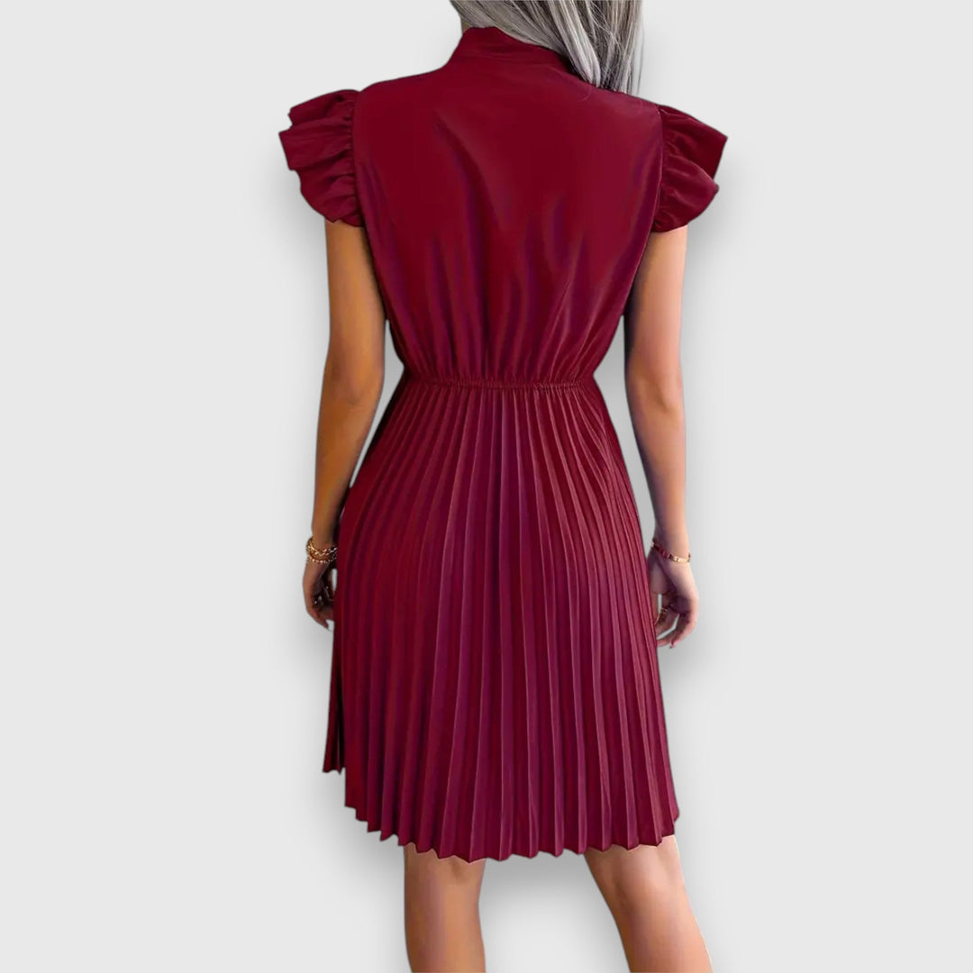 Nivara – Pleated Dress with a Feminine Touch