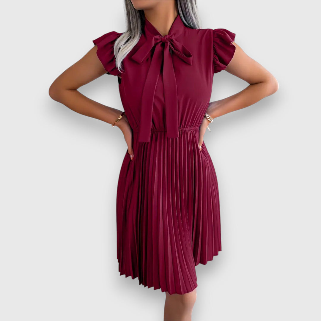 Nivara – Pleated Dress with a Feminine Touch