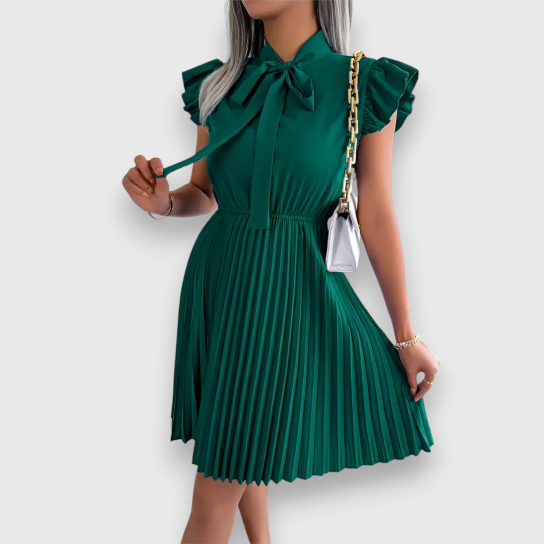 Nivara – Pleated Dress with a Feminine Touch