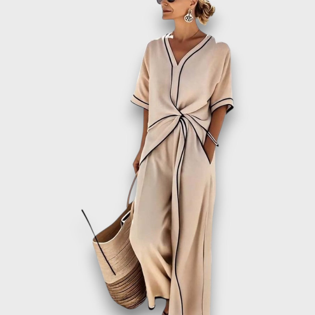Marcellia – Elegant Jumpsuit with Contrast Piping