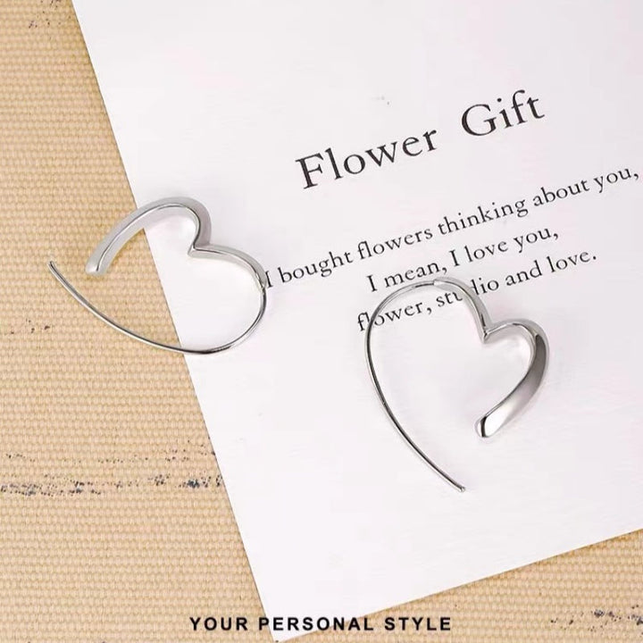 Valenne – Open Heart Thread Earrings with Modern Grace