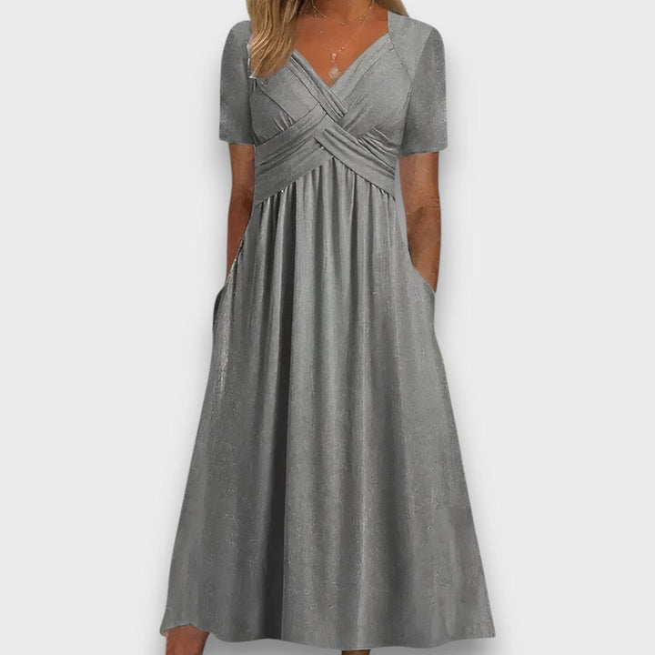 Enyelle – Dress with Delicate Wrap Look