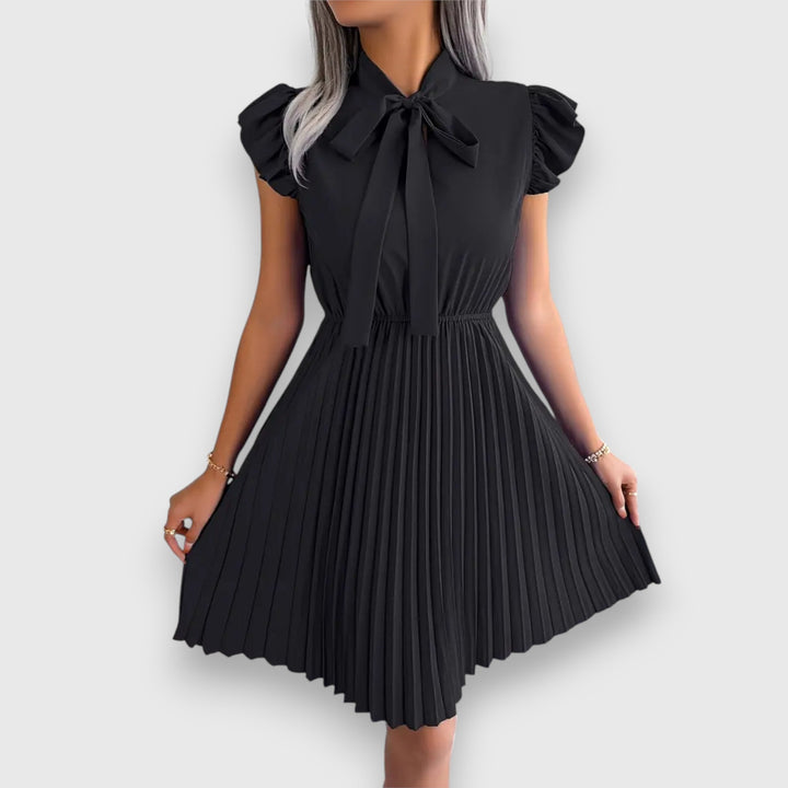 Nivara – Pleated Dress with a Feminine Touch