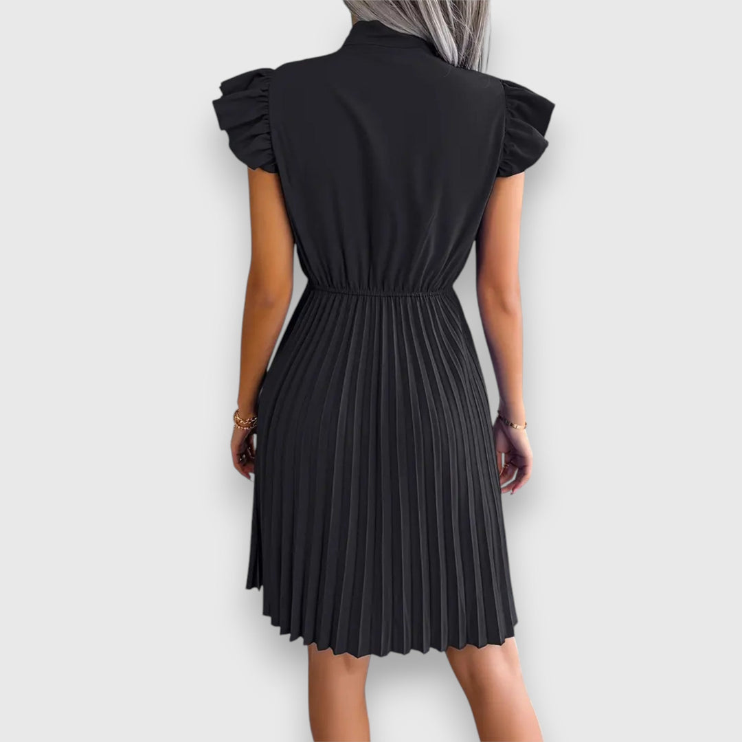 Nivara – Pleated Dress with a Feminine Touch
