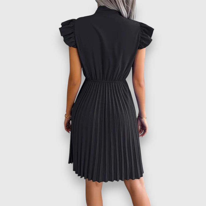 Nivara – Pleated Dress with a Feminine Touch